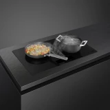 Индукционная варочная панель Smeg HOBD382MB2